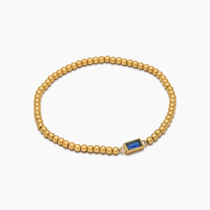 Elegante gouden kralenarmband met geboortesteen