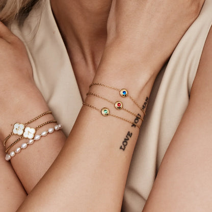 Delicaat mini geboortesteen bedelarmband