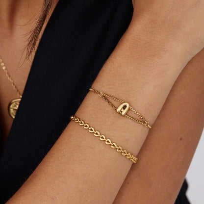 Fijne bubbelbedelarmband met initiaalbedel