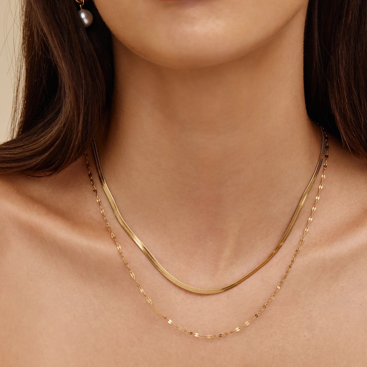 Paillettenversierde slangenketting met meerdere lagen