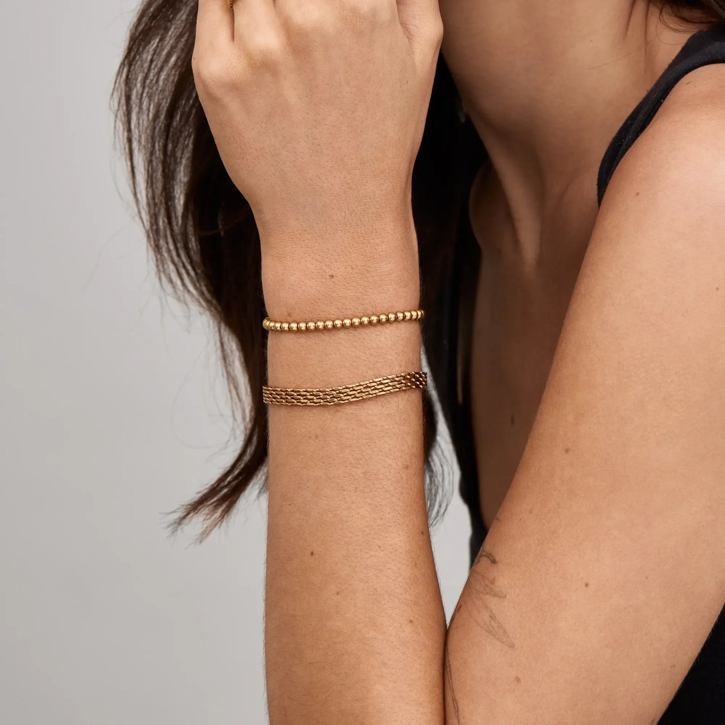 Elegante gouden kralenarmband
