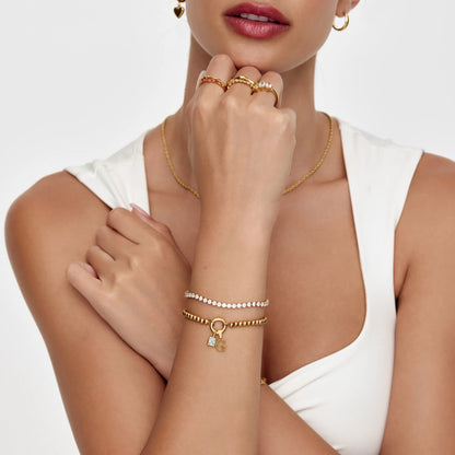 Elegante parel geboortesteen kruisbedelarmband