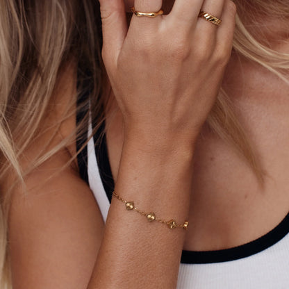 Delicaat mini zonnestraal klavertje-vier armband