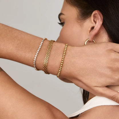 Elegante gouden kralenarmband