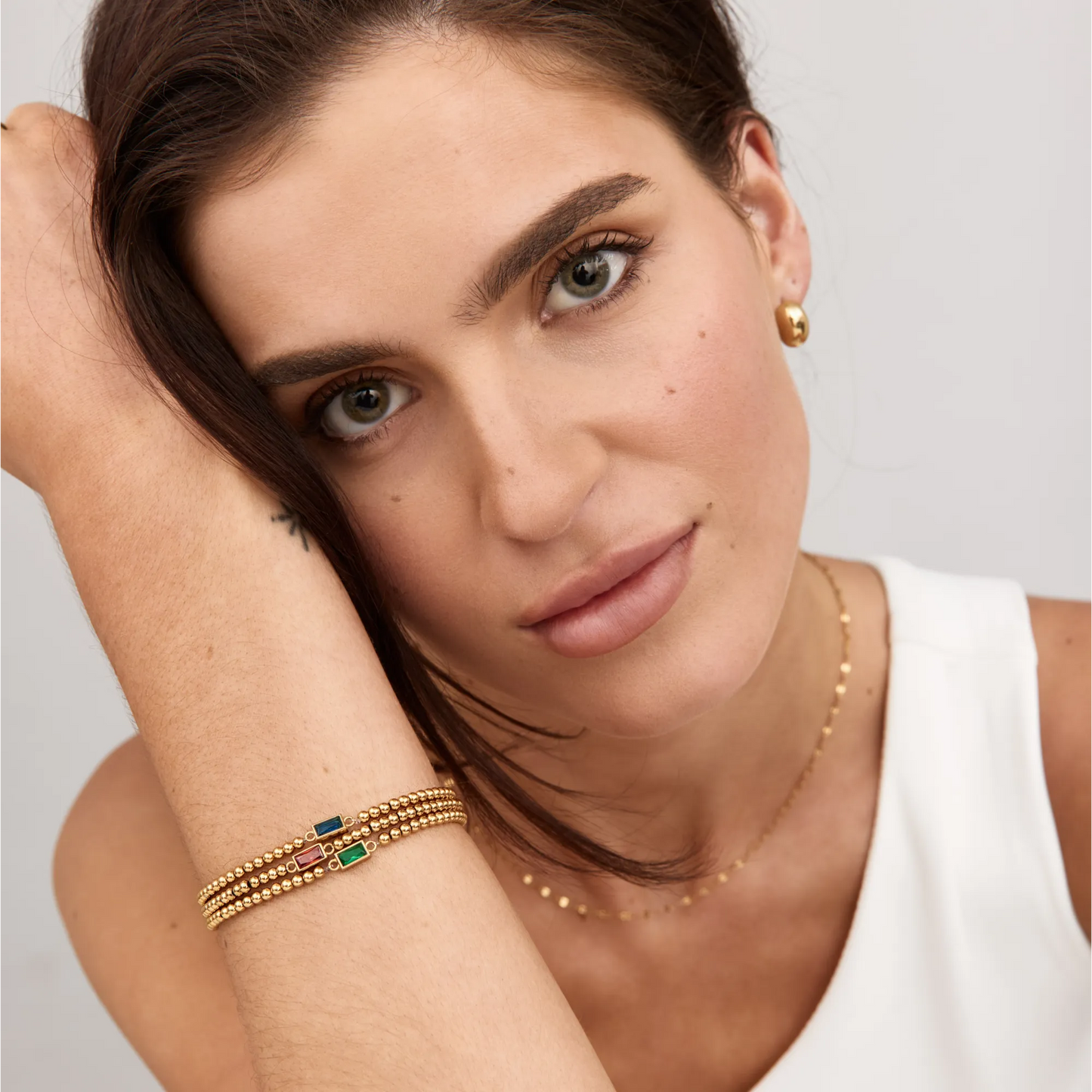 Elegante gouden kralenarmband met geboortesteen