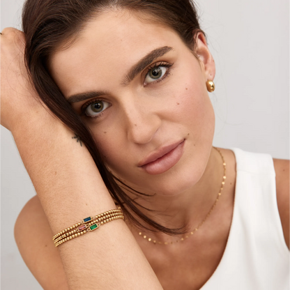Elegante gouden kralenarmband met geboortesteen