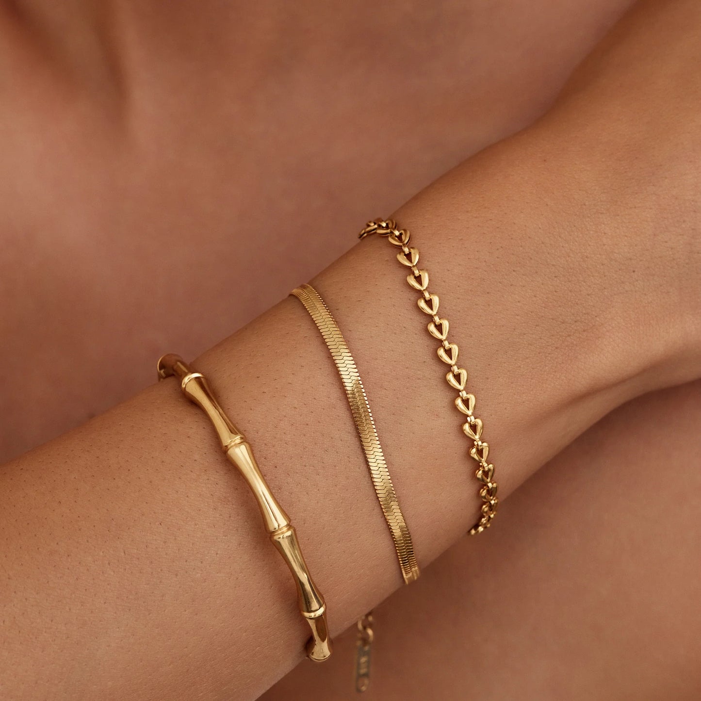 Fijne armband met hartjesketting