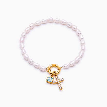Elegante parel geboortesteen kruisbedelarmband