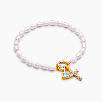 Elegante parel geboortesteen kruisbedelarmband